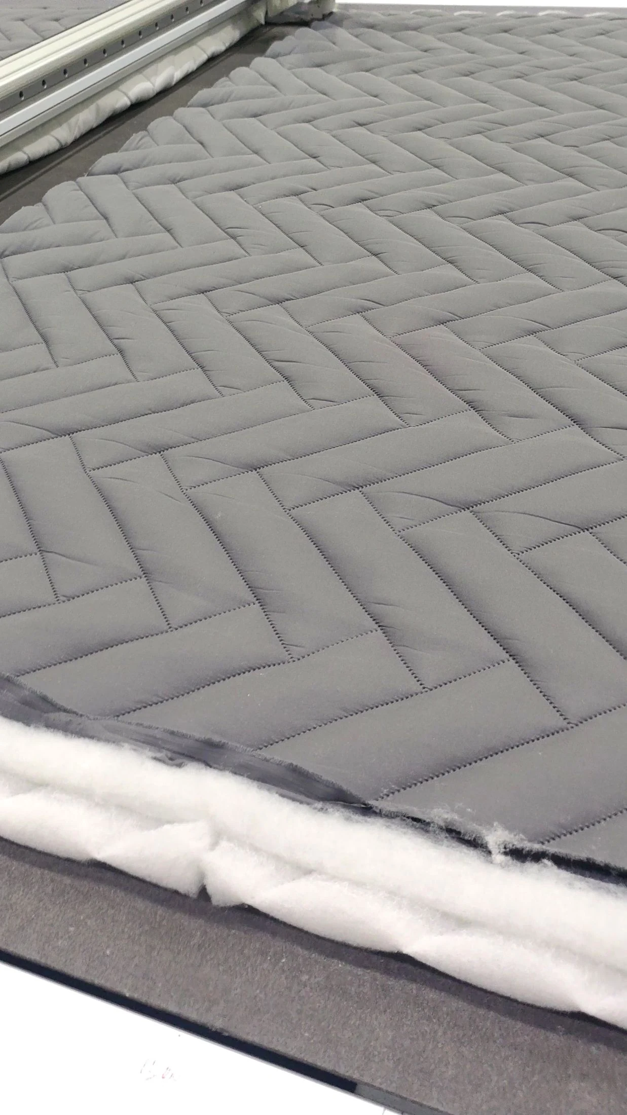 Bound corner of a textile blanket; downstream product example